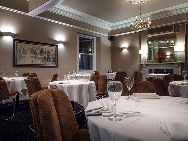 first dining room tables towards fire place